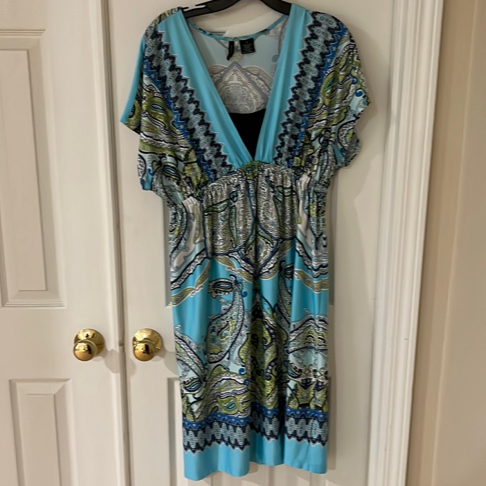Beautiful summer dress size XL. Very flattering and light weight.